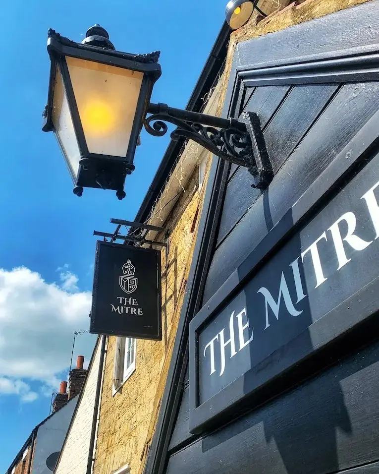Hanging Sign Swingboard on Frontage of The Mitre Pub in Buckingham